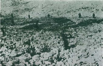 Graves of the murdered people. Italian soldiers around the graves (Italian photo 1941).